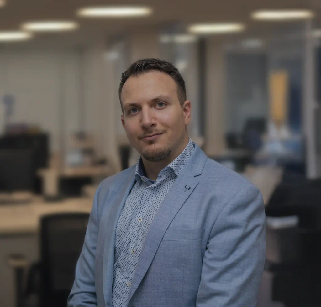 CEO of Nordic Dynamics in professional office setting.